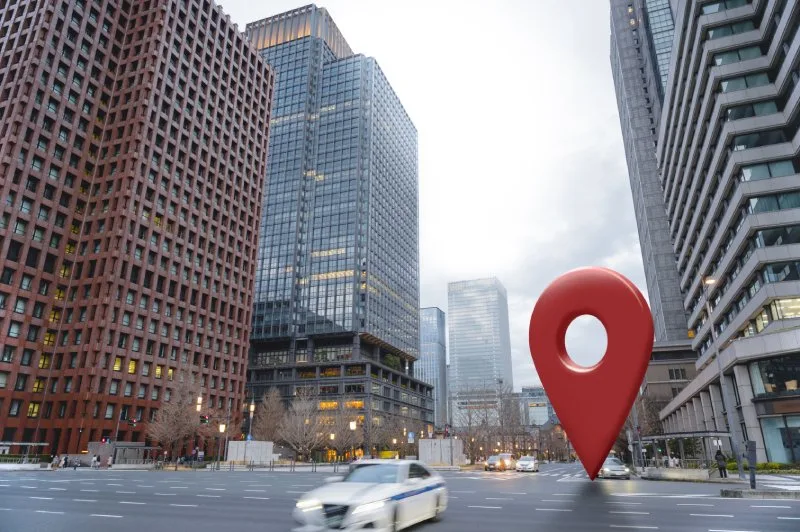 Large location pin symbol representing a financial advisor office in a competitive urban market 