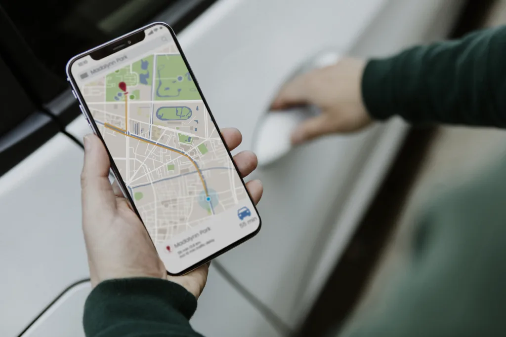 Smartphone map with a route and location pin, representing local search discovery for financial advisors.