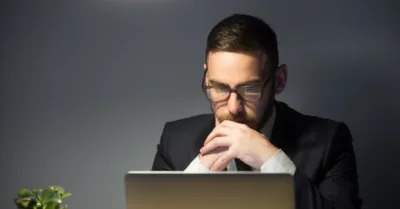 Financial advisor reviewing RIA website performance and qualified lead generation results