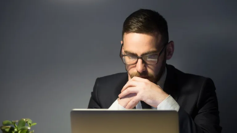 Financial advisor reviewing RIA website performance and qualified lead generation results