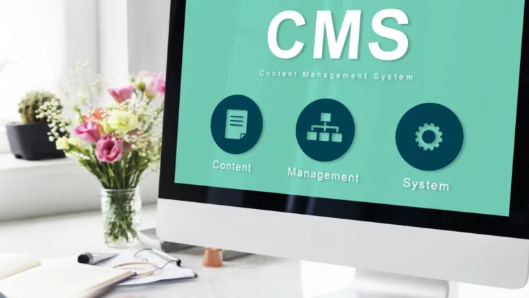 Computer screen displaying CMS content management system concept for SEO optimization and digital website performance.